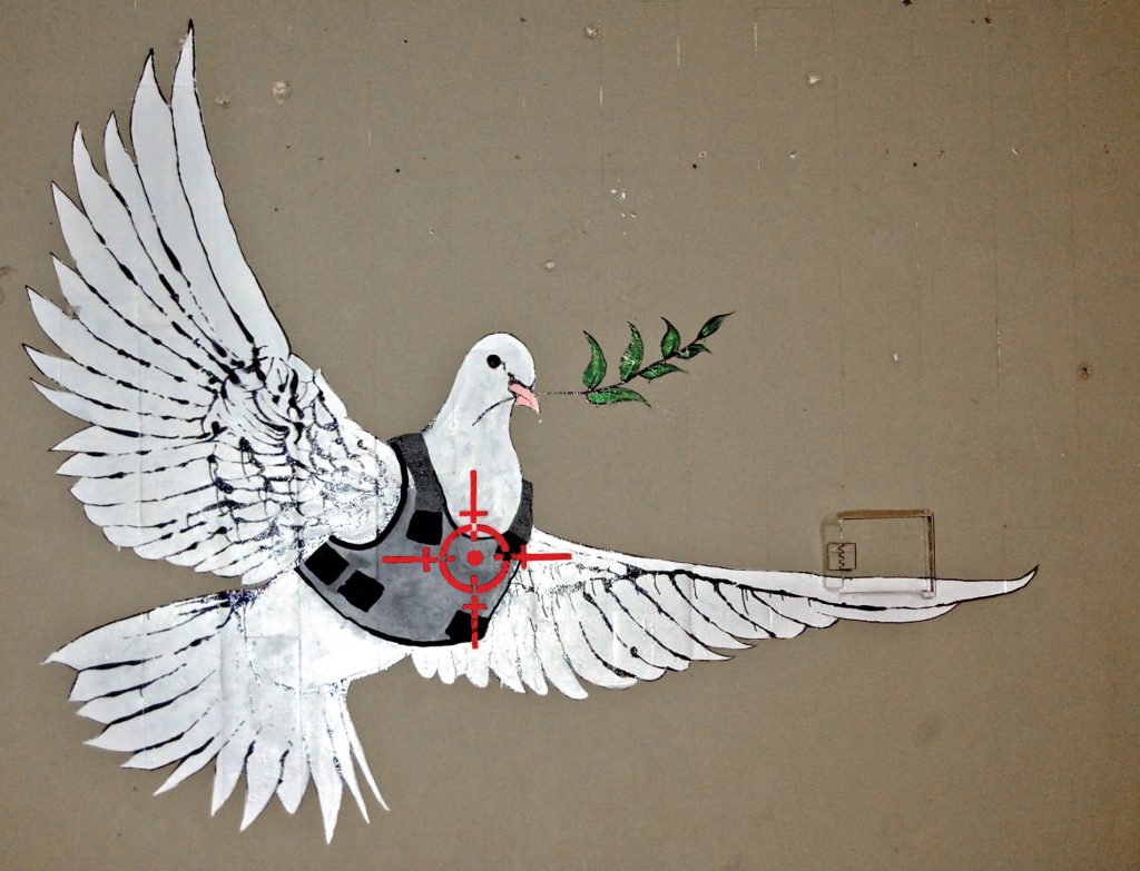 banksy armored dove of peace